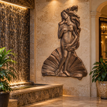 Cast aluminum lady in a shell wall mount for indoor or outdoor design spaces.