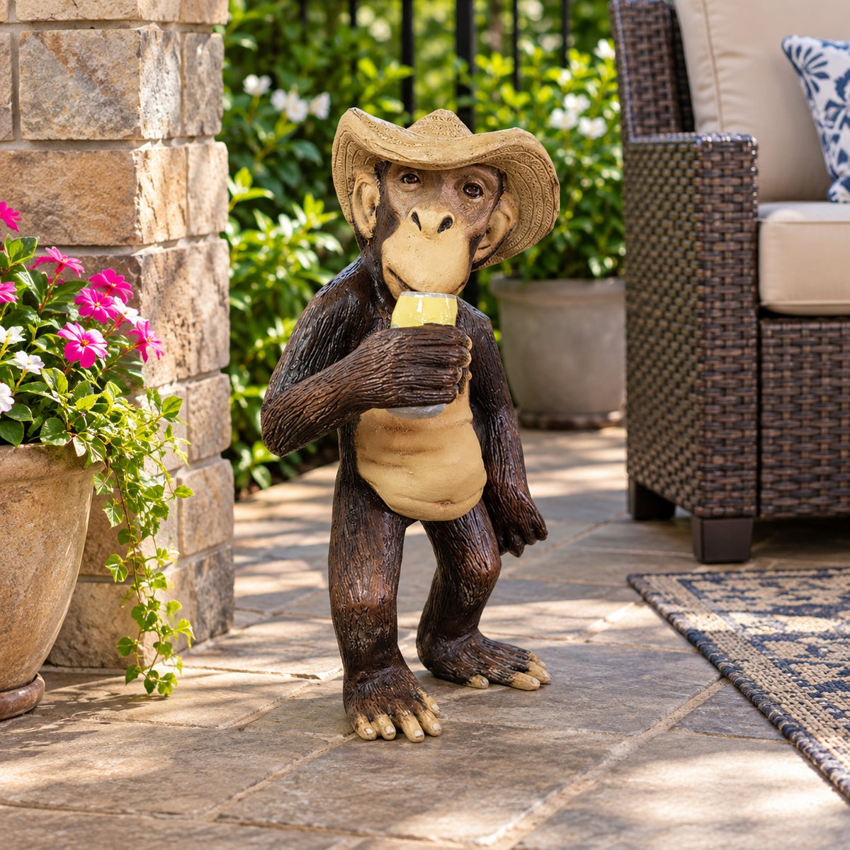 Cast aluminum monkey statue wearing cowboy hat, rustic outdoor decor for yard or garden