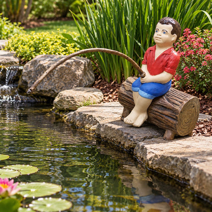 Cast aluminum boy fishing statue on log, outdoor garden decor