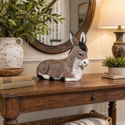 Cast aluminum table-top donkey in natural paint finishes for indoor or outdoor use.